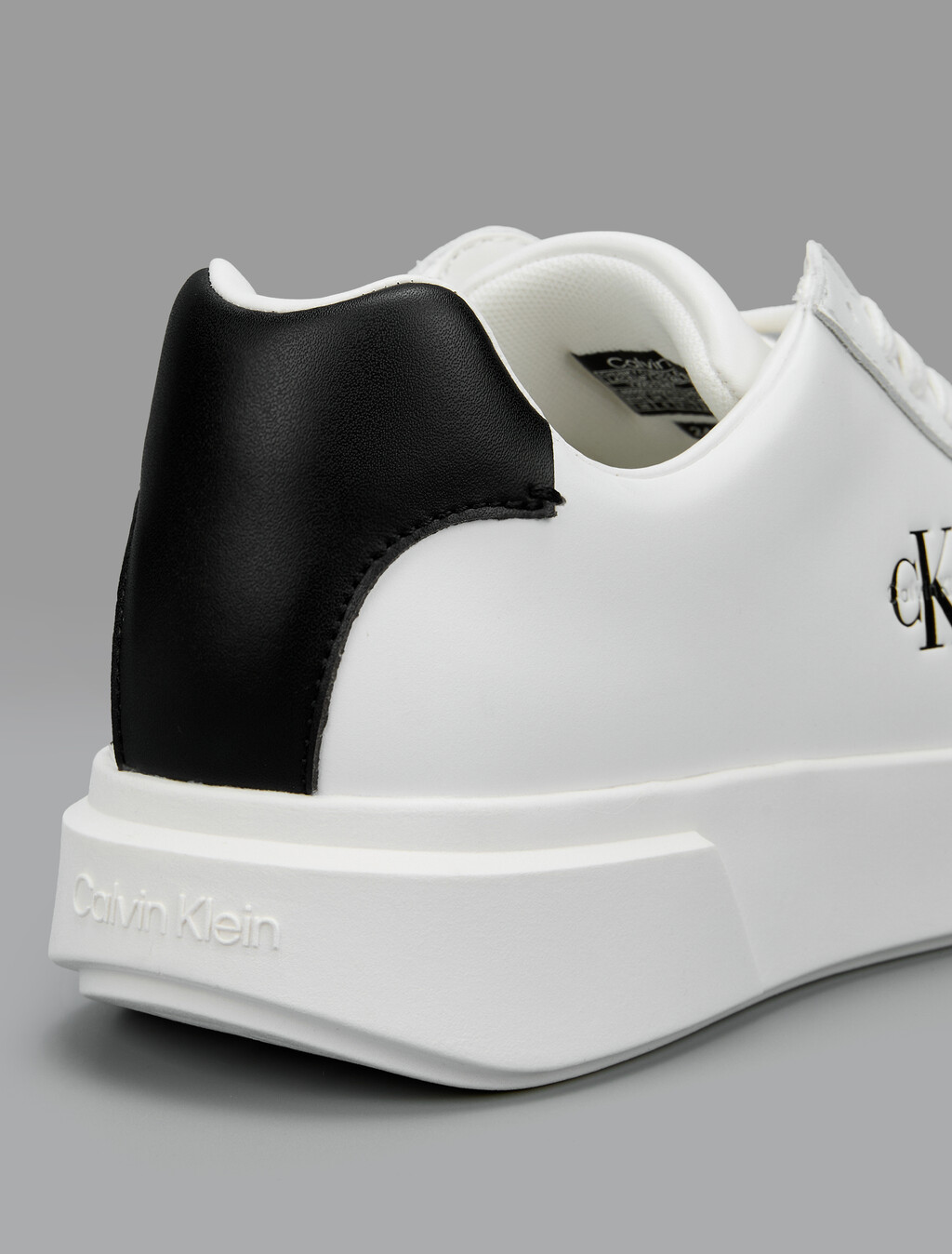 Buy 여성 미네르바 청키 레더 레이스업 컵솔 스니커즈 in color White/Black/White