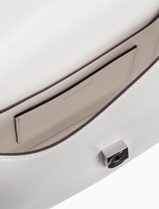 Buy 여성 하드웨어 모노그램 플랩 카메라 백 in color White Alyssum