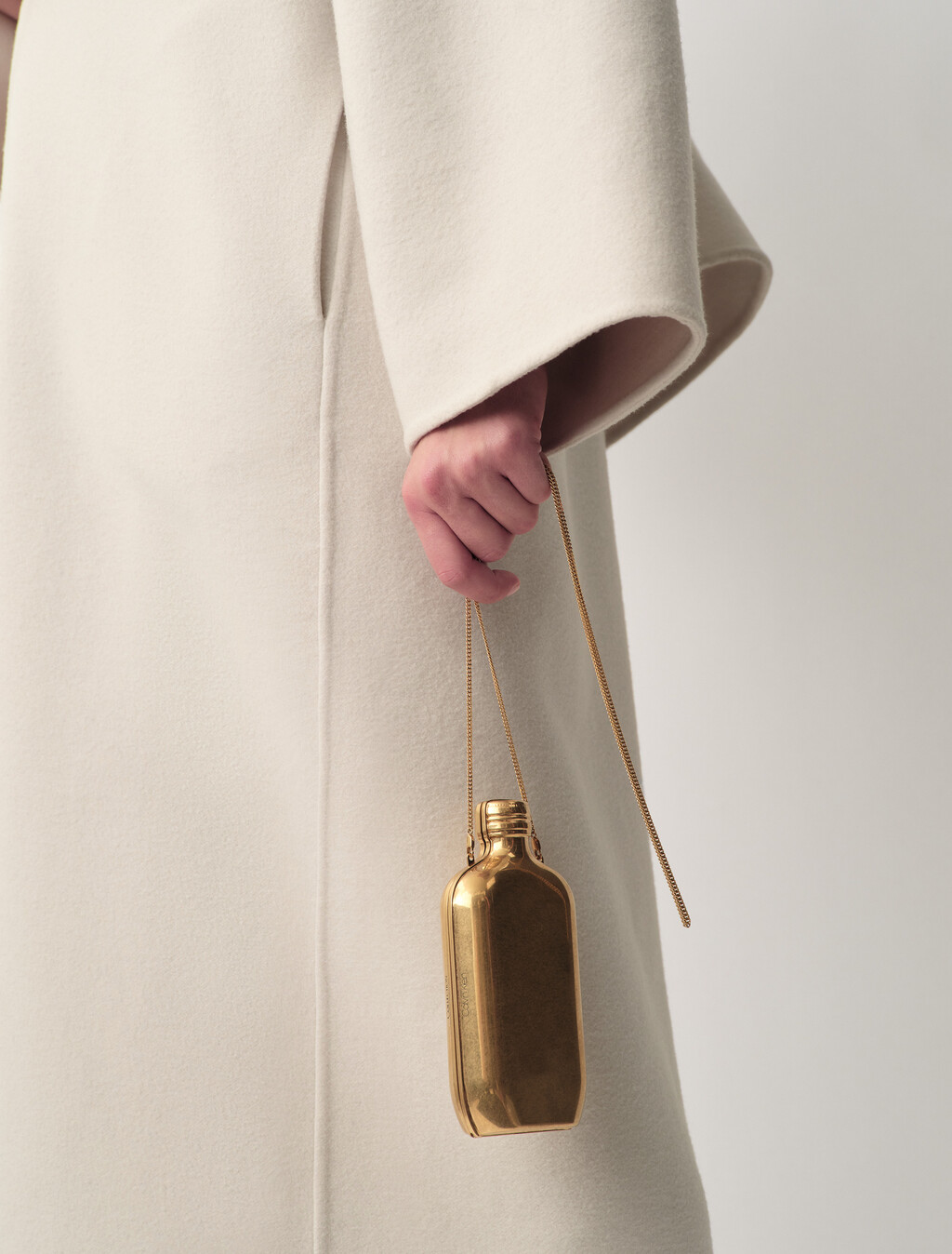Buy THE ONE CLUTCH CULT CK ONE in color GOLD