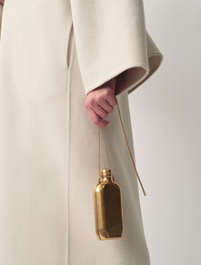 Buy THE ONE CLUTCH CULT CK ONE in color GOLD