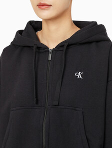 Buy 여성 아카이브 릴렉스핏 CK 스몰 로고 크롭 기모 후드 집업 in color BLACK BEAUTY