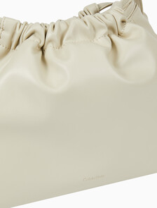 Buy 여성 CKJ 드로우스트링 숄더백 in color BEIGE