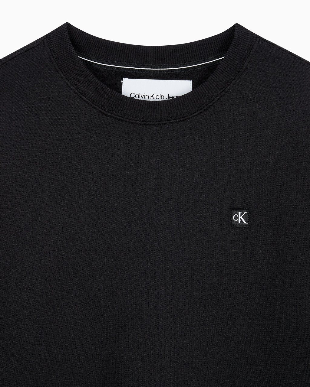 Buy 남성 레귤러핏 CK 뱃지 로고 기모 스웨트셔츠 in color CK BLACK