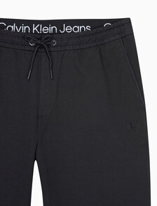 Buy 남성 슬림핏 드로코드 치노 팬츠 in color CK BLACK