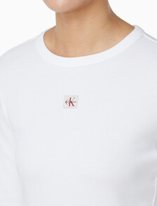 Buy 여성 우븐라벨 크루넥 롱슬리브 탑 in color BRILLIANT WHITE