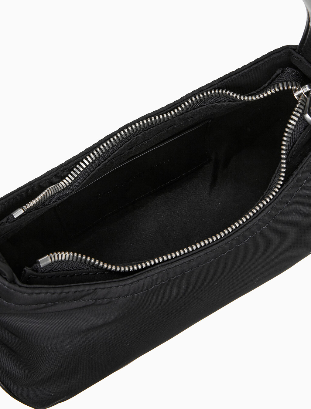 Buy 여성 CKJ 스컬티드 믹스 라운드 숄더백 in color BLACK