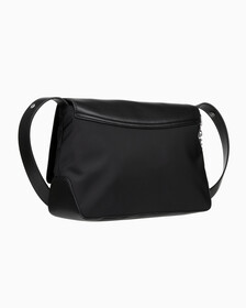 Buy 남녀공용 CKJ 스컬티드 플랩 크로스백 in color BLACK