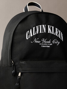 Buy 남녀공용 그래픽 캡슐 라운드 백팩 in color BLACK