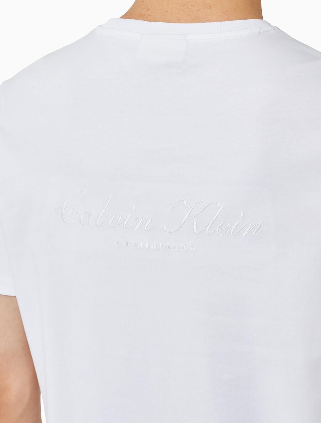 Buy 남성 슬림핏 리퀴드 인터록 클래식 그래픽 티 in color BRIGHT WHITE