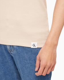 Buy 남성 로고탭 레이서백 슬리브리스 티셔츠 in color CLASSIC BEIGE