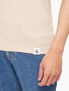Buy 남성 로고탭 레이서백 슬리브리스 티셔츠 in color CLASSIC BEIGE