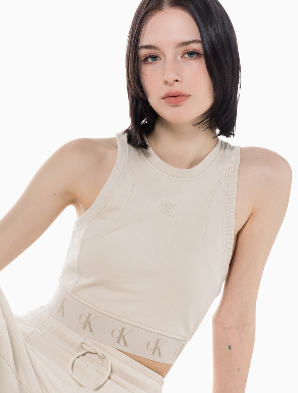 Buy 여성 리피트 크롭 로고 탱크 탑 in color CLASSIC BEIGE