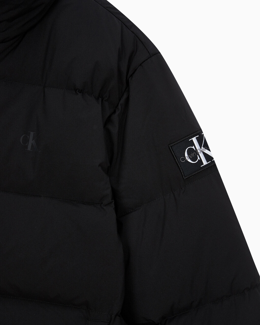 Buy 남성 레귤러핏 스탠드 카라 숏 다운 푸퍼 재킷 in color CK BLACK