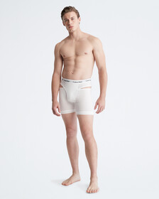 Buy 남성 코튼 스트레치 디컨스트럭티드 트렁크 in color WHITE