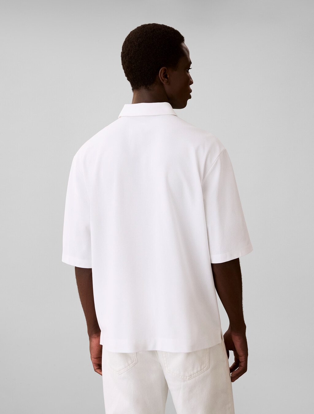 Buy 남성 릴렉스드핏 쿨링 피크 엠보스드 폴로 티 in color BRIGHT WHITE