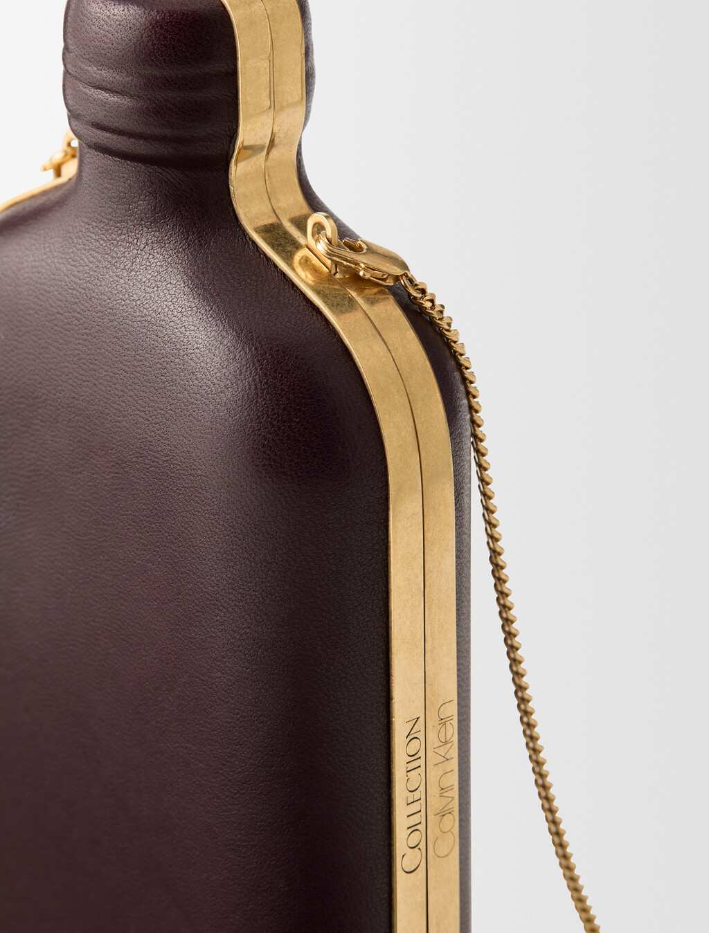 Buy THE ONE CLUTCH CULT CK ONE in color Cocoa