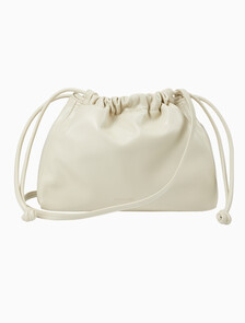 Buy 여성 CKJ 드로우스트링 크로스바디 in color BEIGE