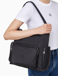 Buy 여성 포켓 나일론 사첼 in color BLACK