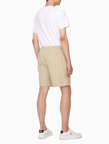 Buy 남성 텍스처드 코튼 쇼츠 in color PALE KHAKI