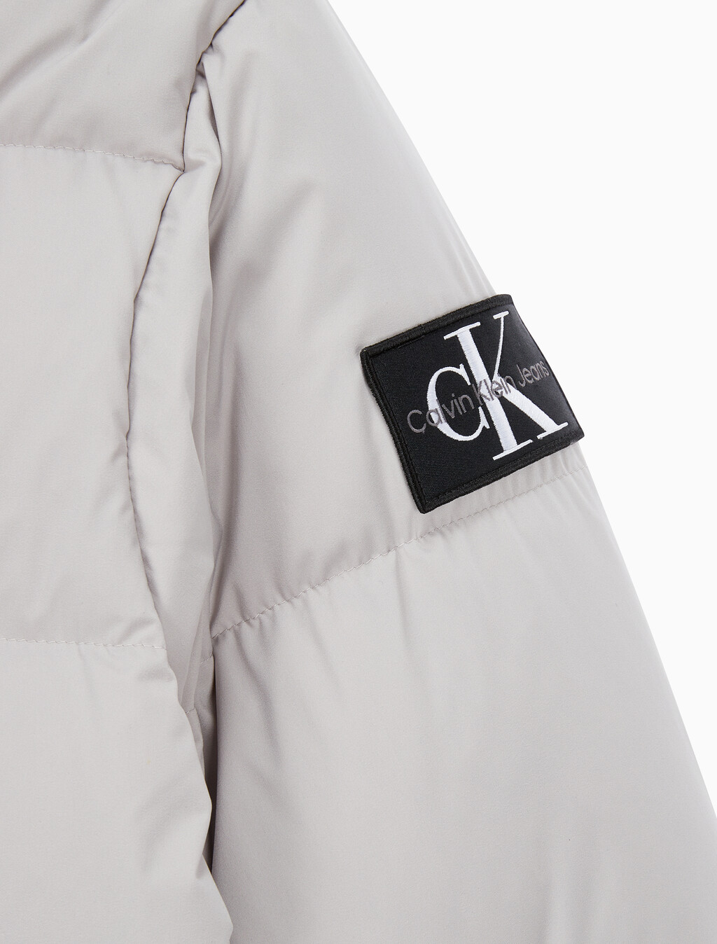 Buy 남성 레귤러핏 스탠드 카라 숏 다운 푸퍼 재킷 in color GREY