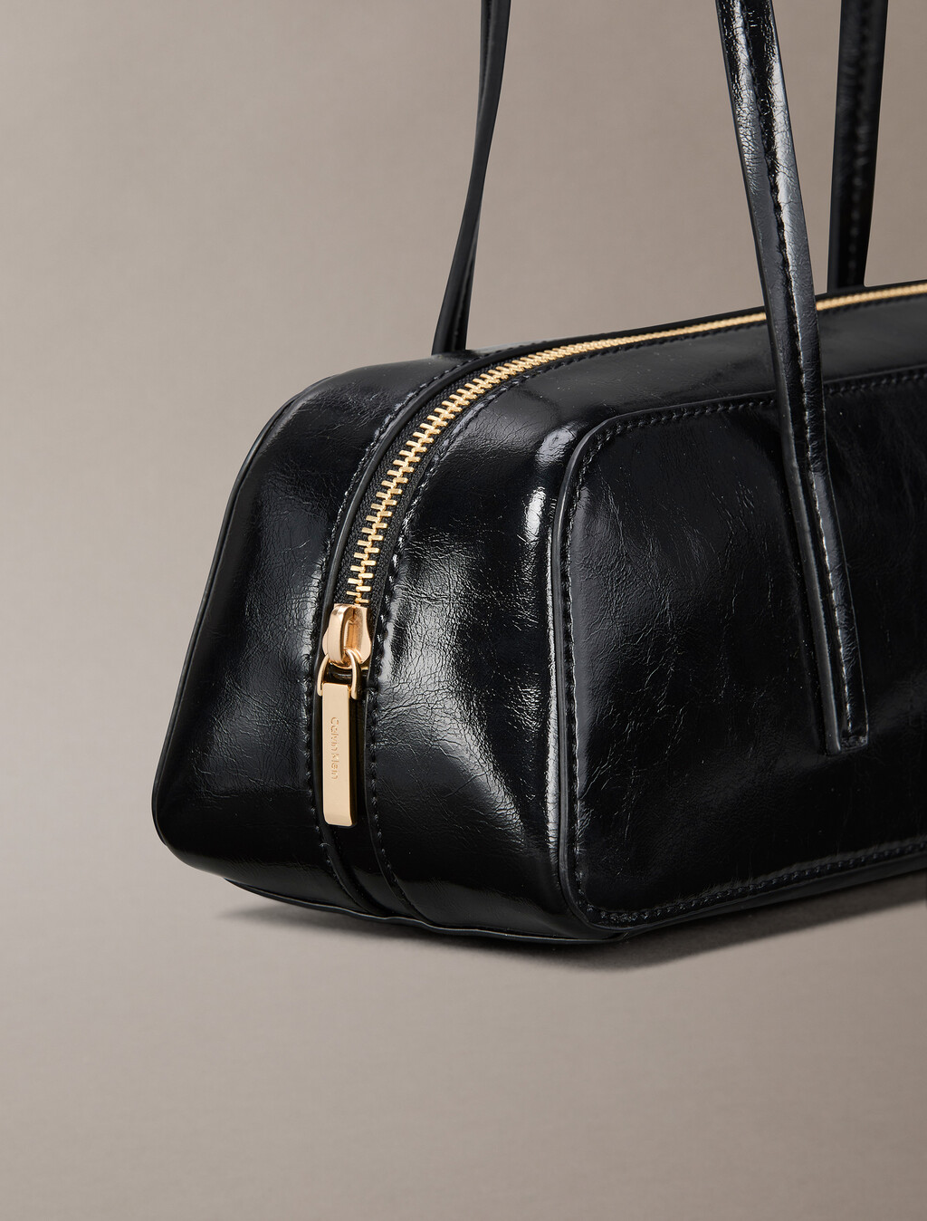 Buy 여성 엠보스드 로고 포일 글로시 발레토 백 in color BLACK