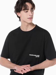 Buy 남성 릴렉스핏 CK 스프레이 로고 반팔 티셔츠 in color CK BLACK