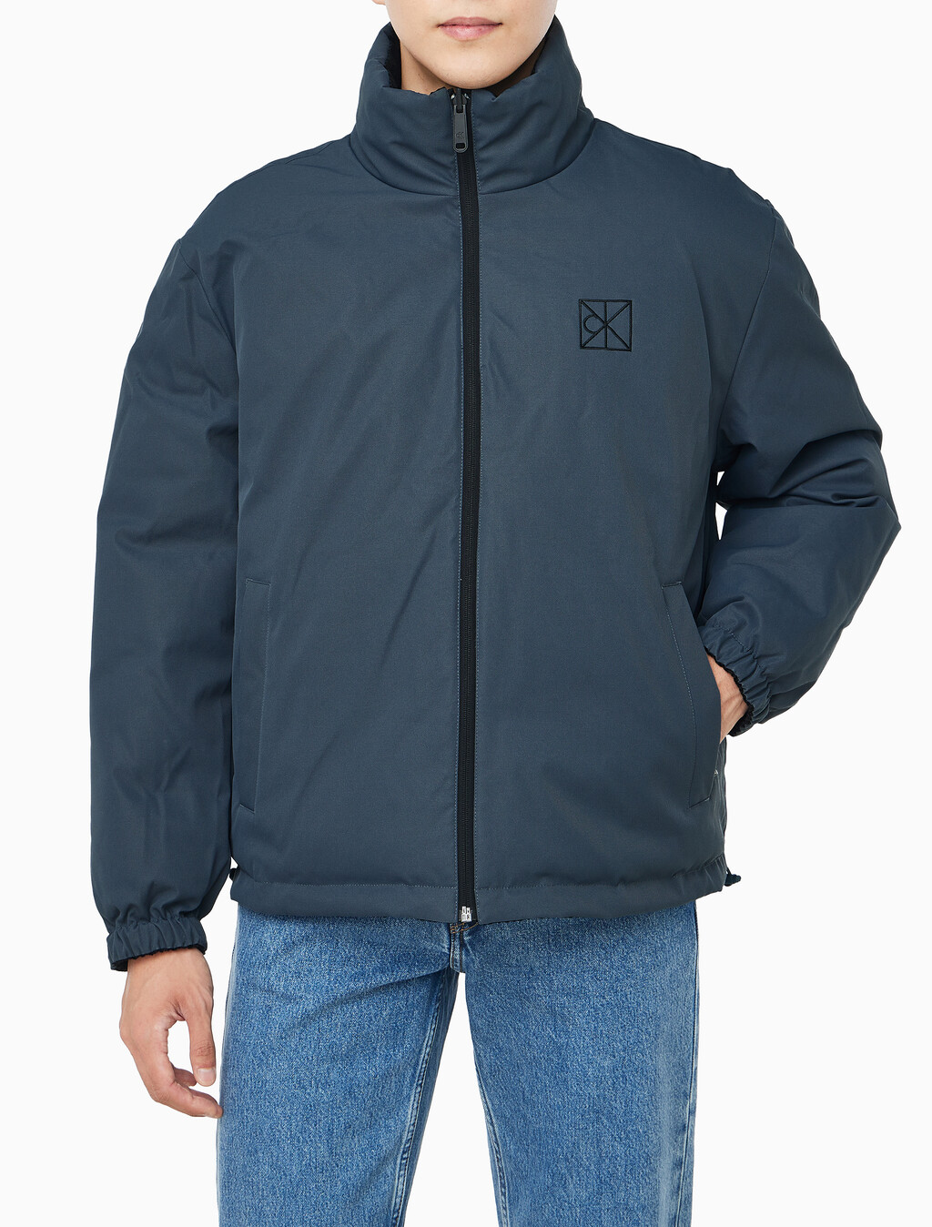 Buy 남성 나일론 리버서블 올오버프린트 다운 푸퍼 자켓 in color BLACK