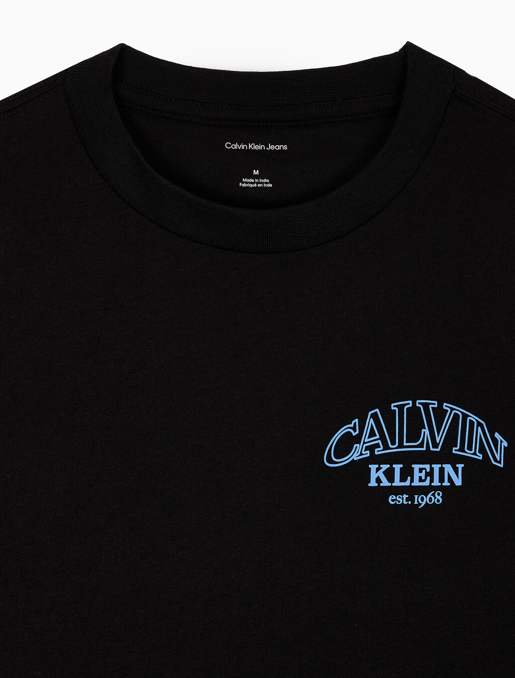 Buy 릴렉스드 저지 엠보스드 모노로고 티 in color BLACK