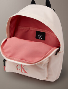 Buy 여성 볼드 로고 나일론 스몰 라운드 백팩 in color Pink