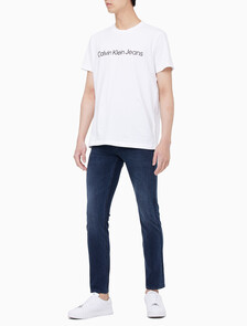 Buy 남성 레귤러핏 인스티튜셔널 로고 스트레치 반팔 티셔츠  in color BRIGHT WHITE
