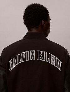 Buy 코튼 캔버스 바시티 자켓 in color BLACK