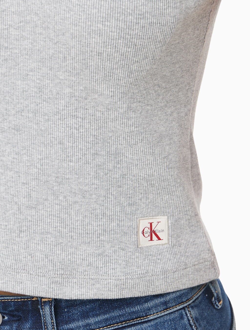 Buy 여성 우븐라벨 슬리브리스 하프 집업 탑 in color HEROIC GREY HEATHER