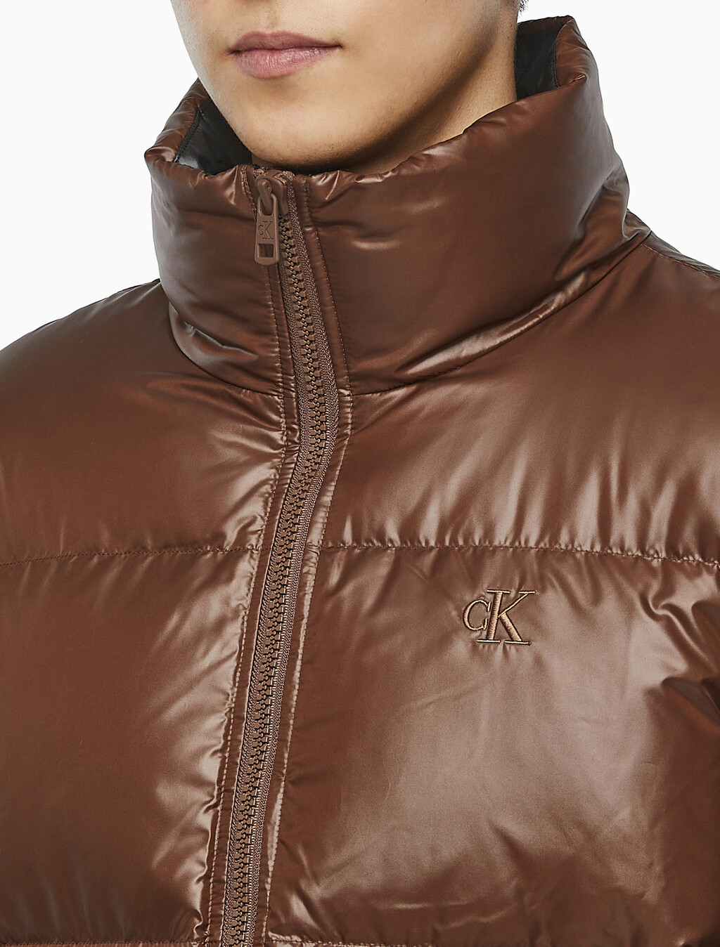 Buy 남녀공용 글로시 숏 푸퍼 in color DARK BROWN