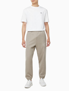 Buy 남성 더블 니트 립 로고 조거 팬츠 in color VINTAGE KHAKI
