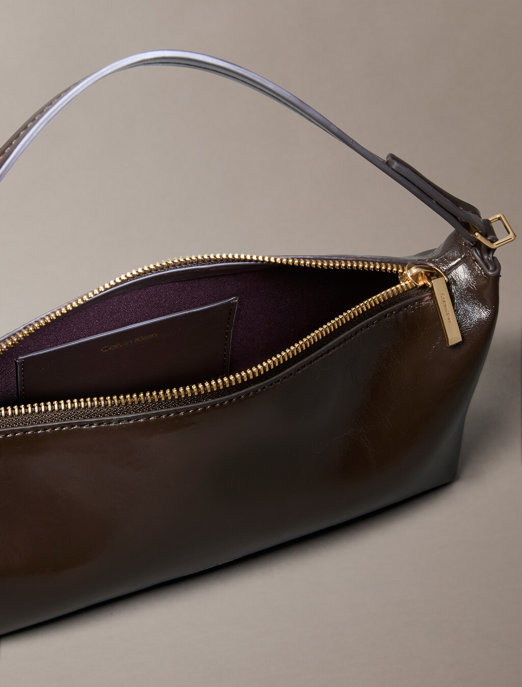 Buy 여성 엠보스드 로고 포일 글로시 콘브 백 in color Brown