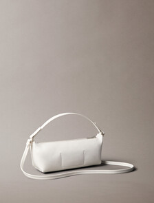 Buy 여성 엠보스드 로고 포일 글로시 콘브 백 in color White Alyssum