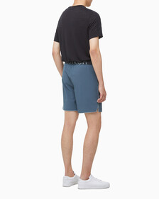 Buy 남성 레귤러핏 우븐 쇼츠 in color OCEAN TEAL/ BLK