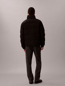 Buy 남성 나일론 리버서블 올오버프린트 다운 푸퍼 자켓 in color BLACK