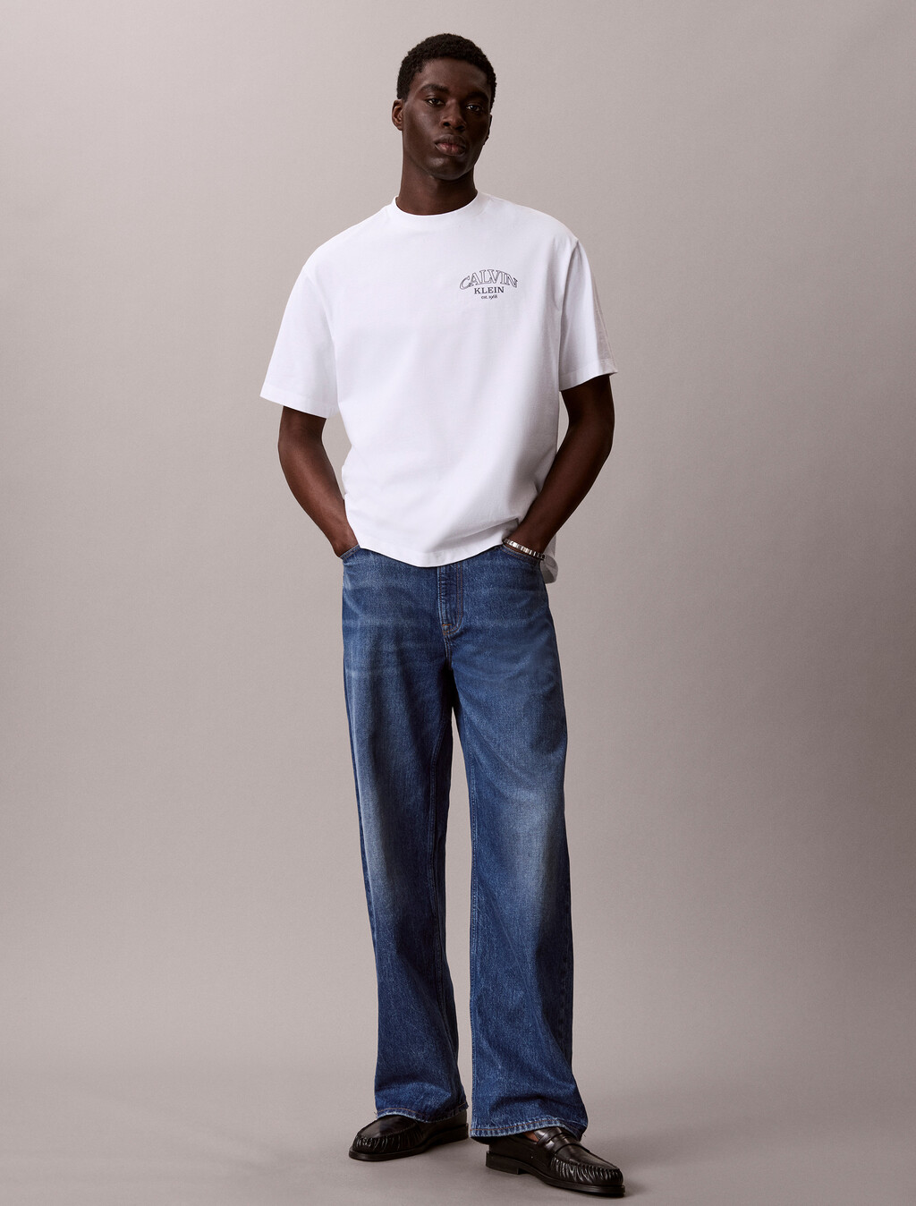 Buy 릴렉스드 저지 엠보스드 모노로고 티 in color BRIGHT WHITE