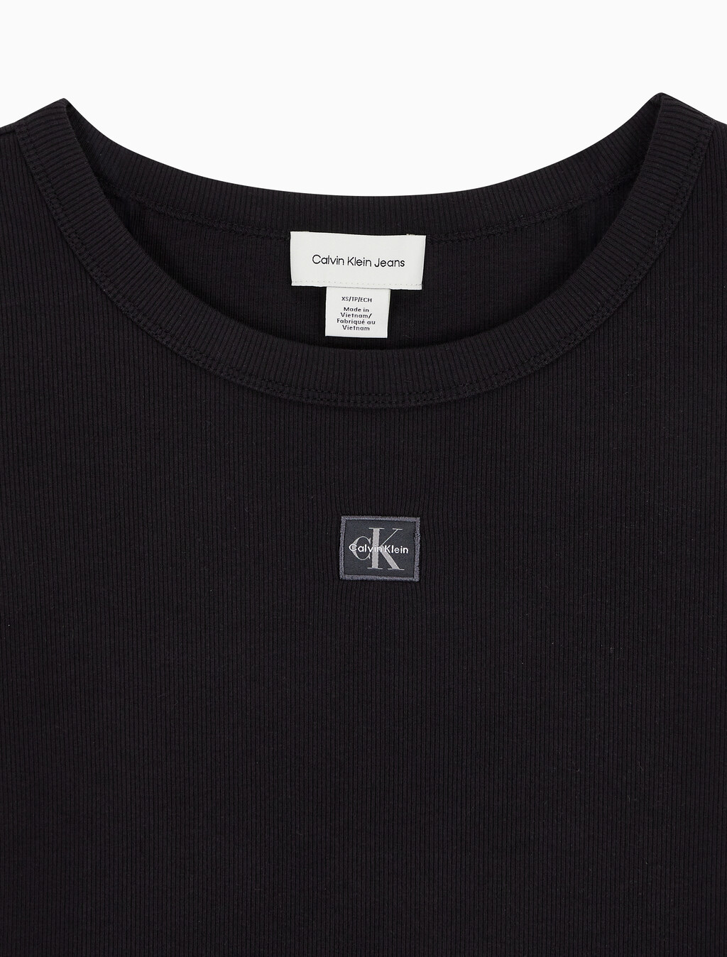 Buy 여성 우븐라벨 립 베이비 티 in color BLACK