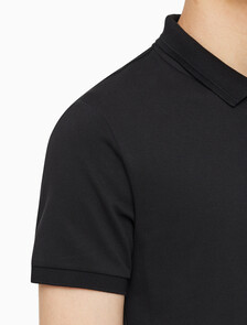 Buy 남성 슬림핏 CK 로고 뱃지  폴로 티셔츠 in color CK BLACK