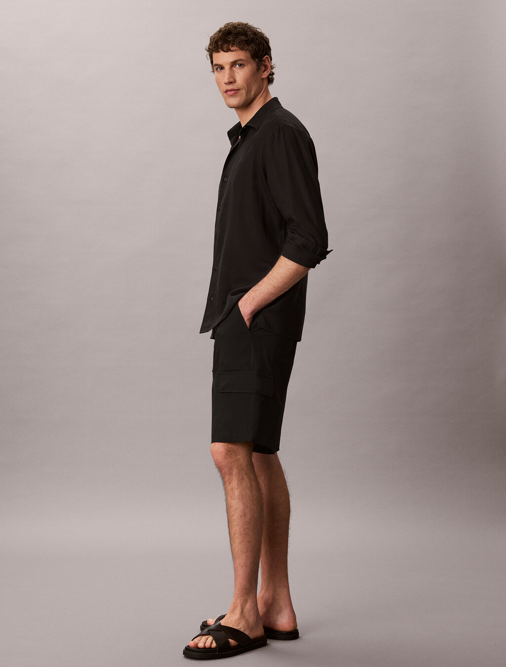 Buy 테크 나일론 릴렉스 유틸리티 쇼츠 in color BLACK