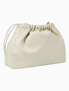 Buy 여성 CKJ 드로우스트링 숄더백 in color BEIGE