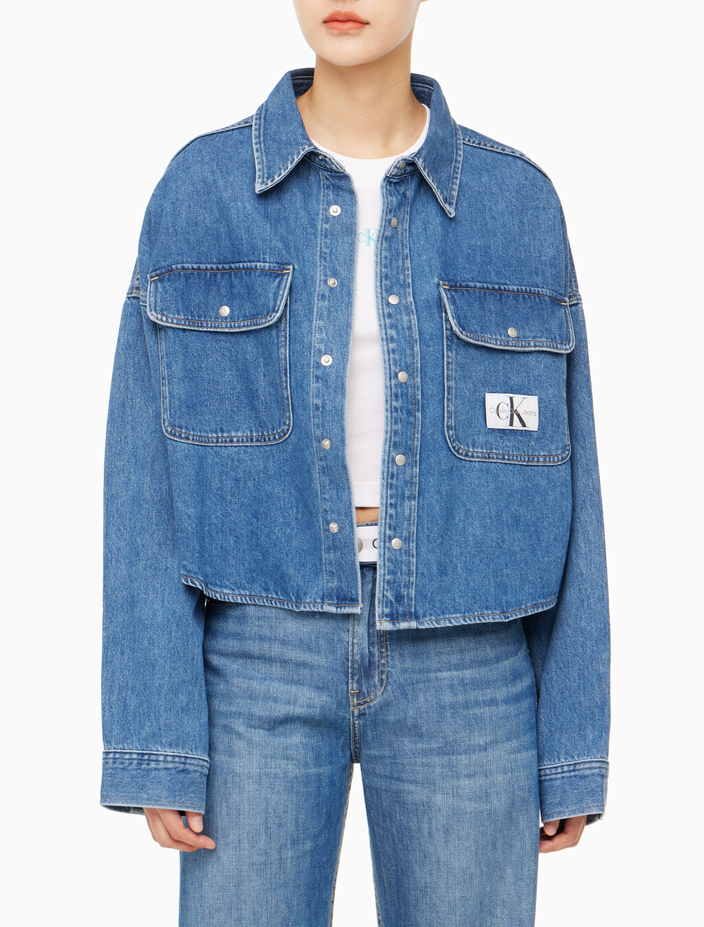 Buy 여성 오버사이즈핏 미드블루 크롭 데님 재킷 in color MID BLUE BACK EMBRO