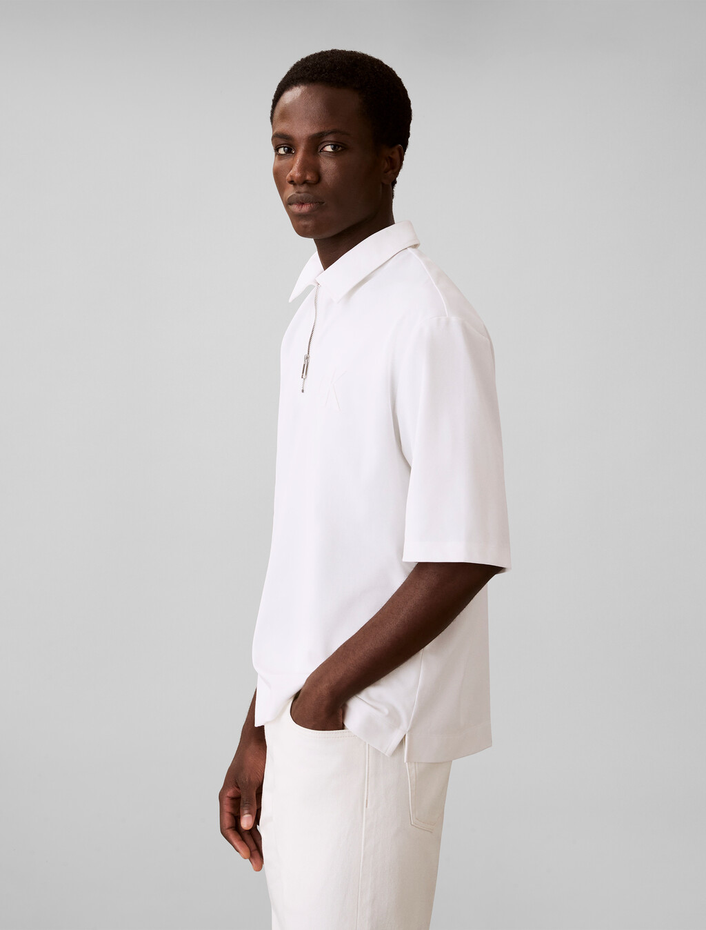 Buy 남성 릴렉스드핏 쿨링 피크 엠보스드 폴로 티 in color BRIGHT WHITE