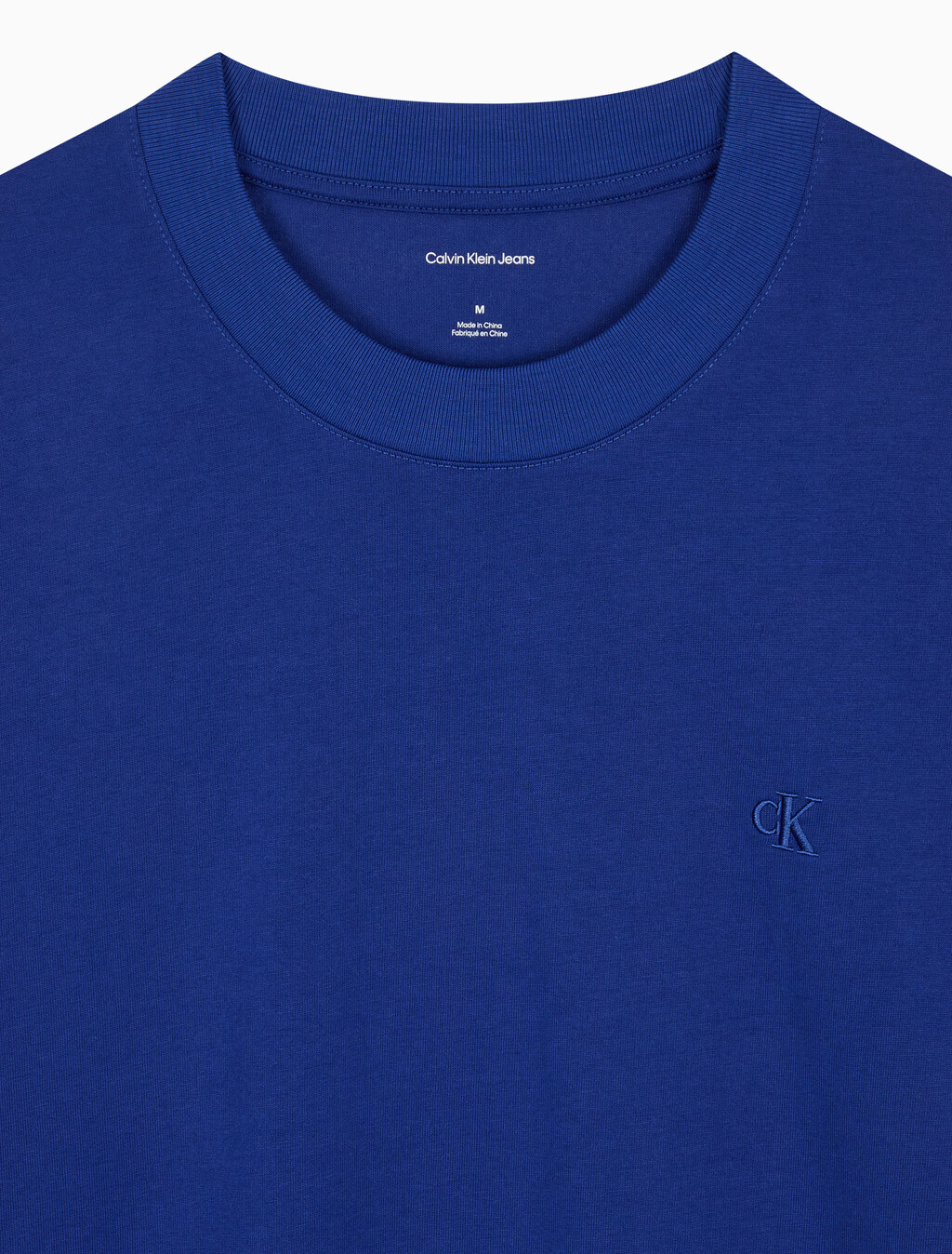 Buy 남성 오버핏 엠보스 모노로고 티 in color Blue