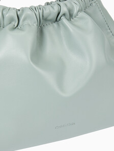 Buy 여성 CKJ 드로우스트링 크로스바디 in color KHAKI GREY