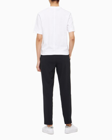 Buy 여성 릴렉스 핏 볼드 로고 반팔 티셔츠 in color BRIGHT WHITE