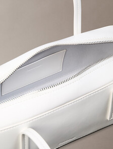 Buy 여성 엠보스드 로고 포일 글로시 발레토 백 in color White Alyssum