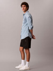 Buy 나일론 그래픽 쇼츠 in color BLACK